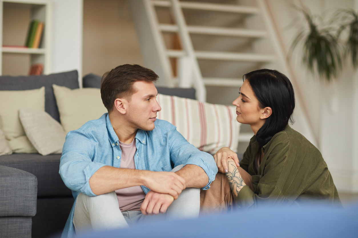 couple talking after learning how to help an alcoholic spouse